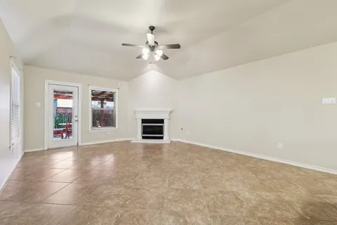 a view of an empty room with a bathroom