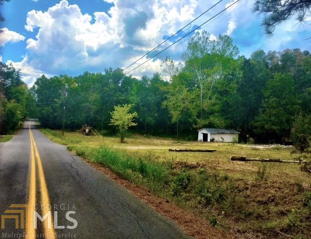 4282 Blacks Bluff Road Southwest Rome, GA 30161 - Photo 1 of 1 a view of a yard with swimming pool