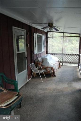 54 Spring Hollow Road Front Royal, VA 22630 - Photo 12 of 17 Screened-in Porch