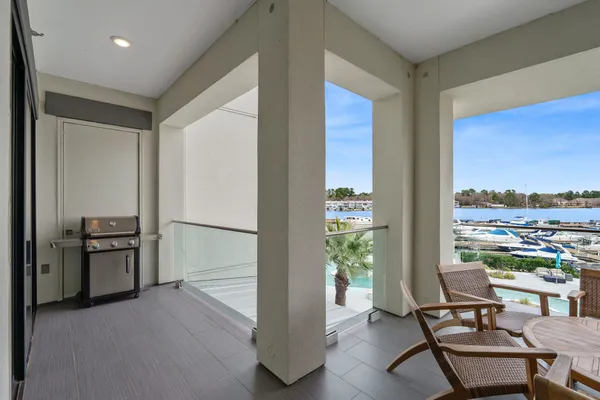 a view of a livingroom with furniture and front door