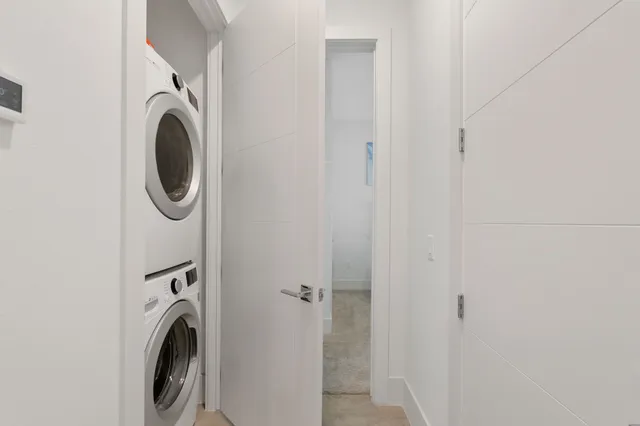 a view of a hallway with paintings on the wall