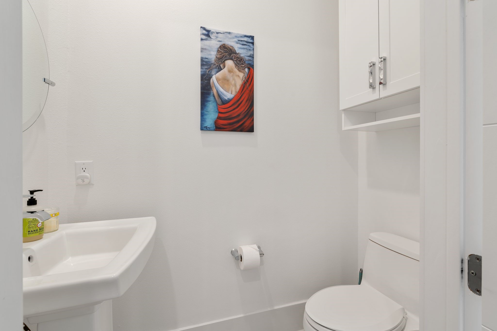 199 Waterpoint Court, Unit 213 Montgomery, TX 77356 - Photo 32 of 46 a bathroom with a toilet and a sink