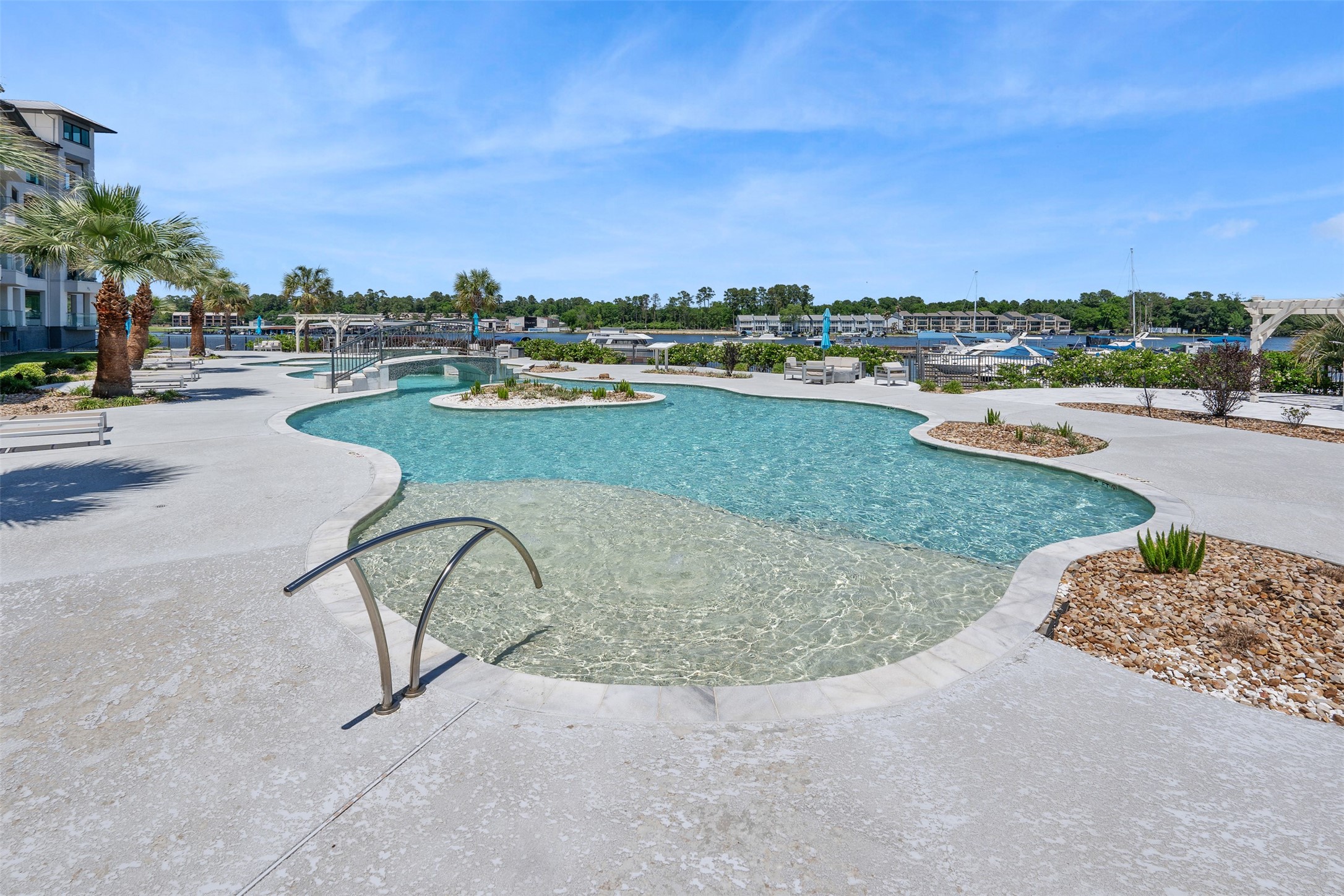 199 Waterpoint Court, Unit 213 Montgomery, TX 77356 - Photo 45 of 46 a view of a outdoor space and swimming pool
