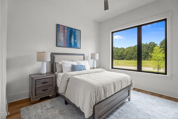 a bathroom with a bathtub a toilet and a shower