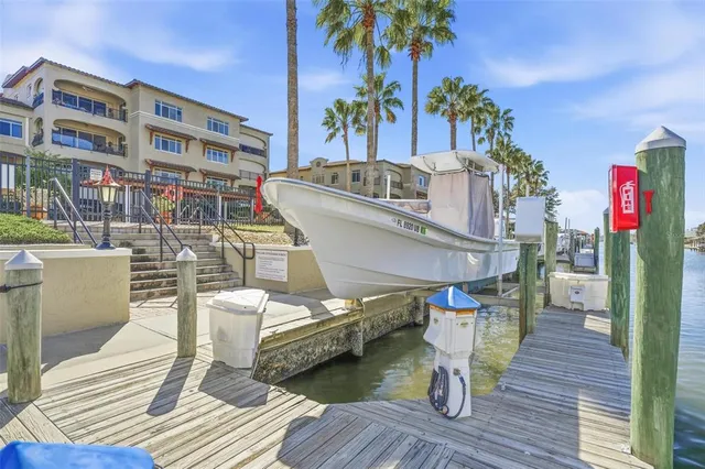 swimming pool view with a seating space