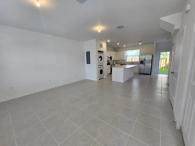 a view of a living room and chandelier living room