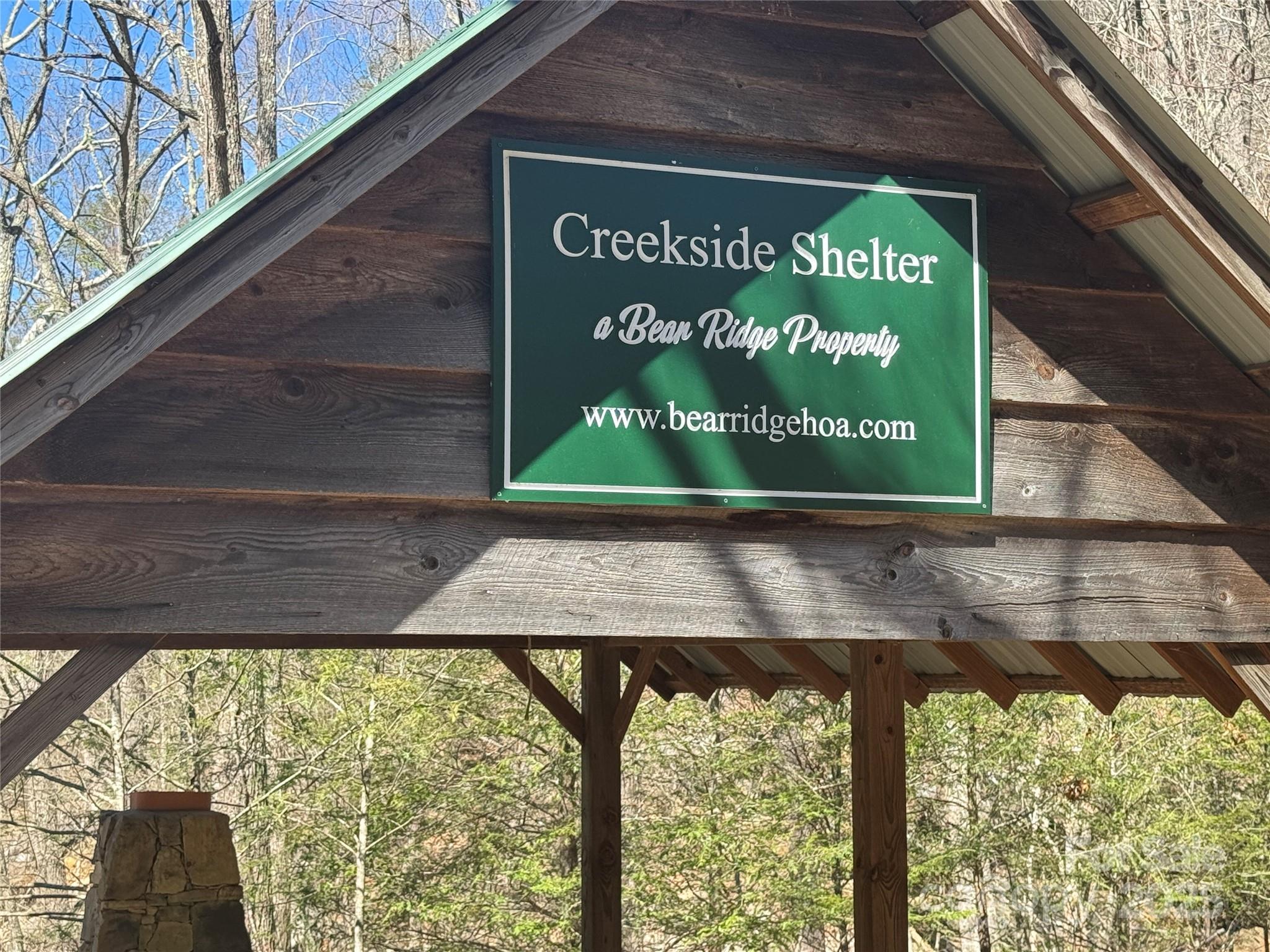 0 Beech Thicket Springs Road, Unit 41 Bakersville, NC 28705 - Photo 18 of 22 a sign on the side of a building