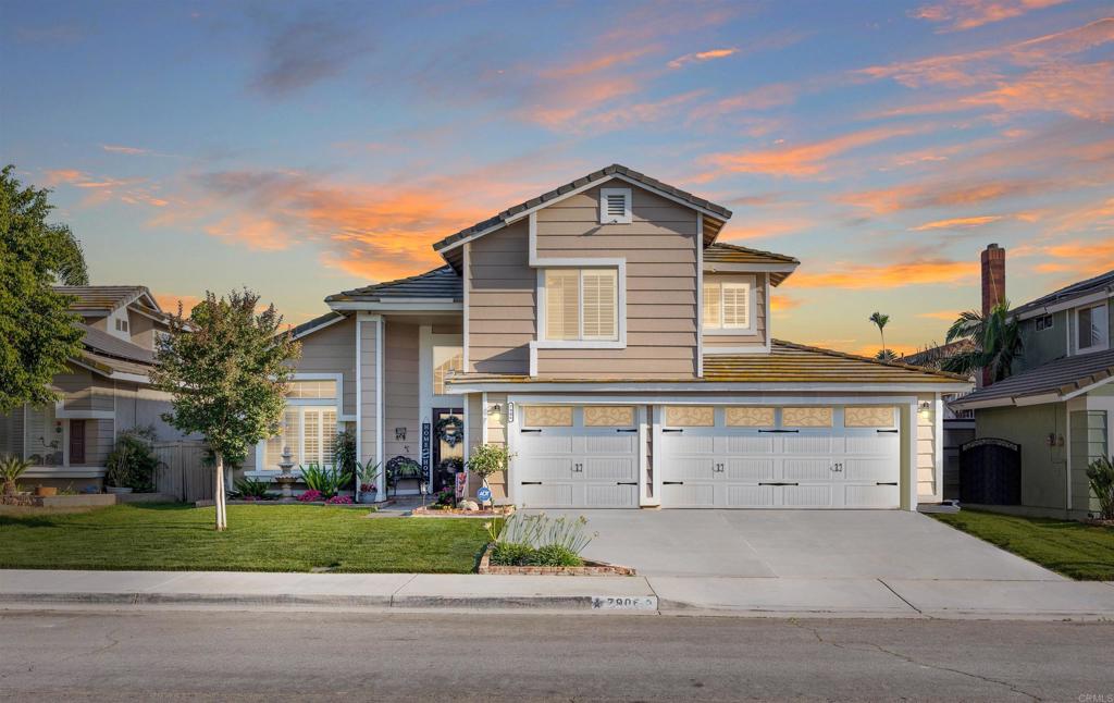 7906 Wendover Drive Riverside, CA 92509 - Photo 1 of 1 a front view of a house with a yard and garage