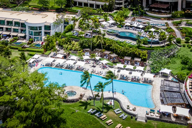 a view of a field with an ocean