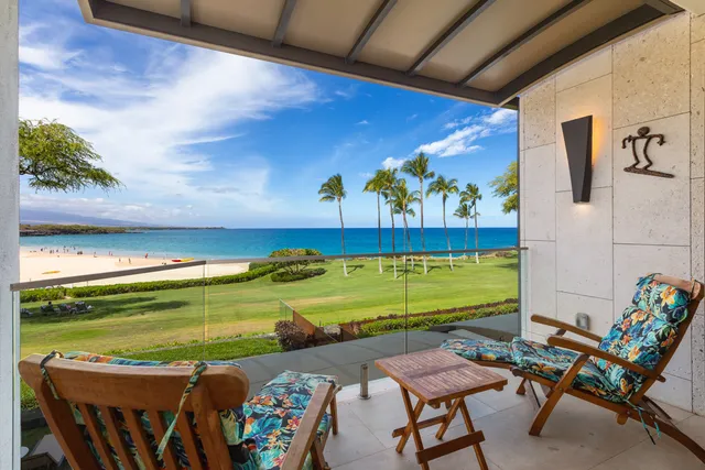a view of a swimming pool with a lounge chairs
