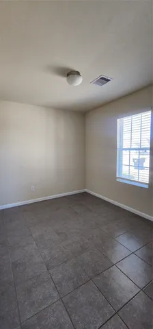 en empty room with windows