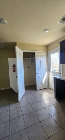 a view of a kitchen with a sink