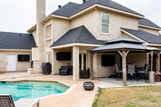 a view of a house with patio