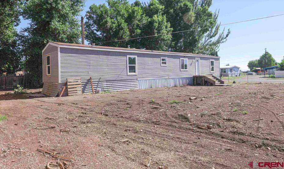 11 Rickey Place Monte Vista, CO 81144 - Photo 2 of 16 a view of a backyard