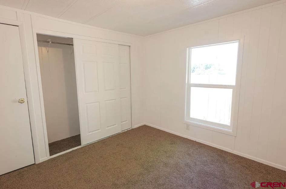 11 Rickey Place Monte Vista, CO 81144 - Photo 3 of 16 an empty room with a window