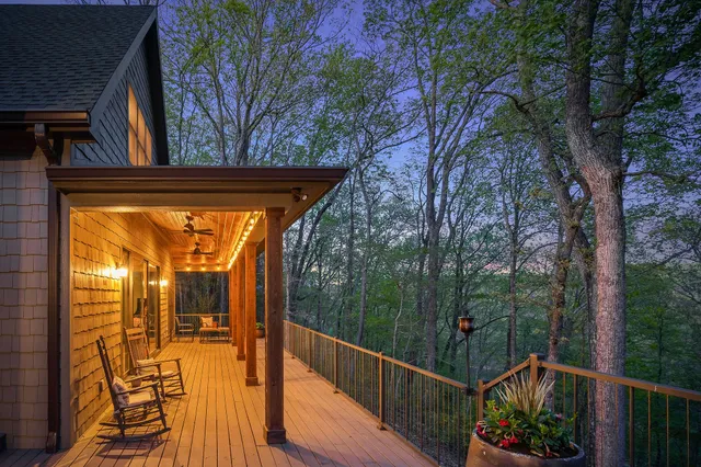 a view of a swimming pool with an outdoor space and seating area