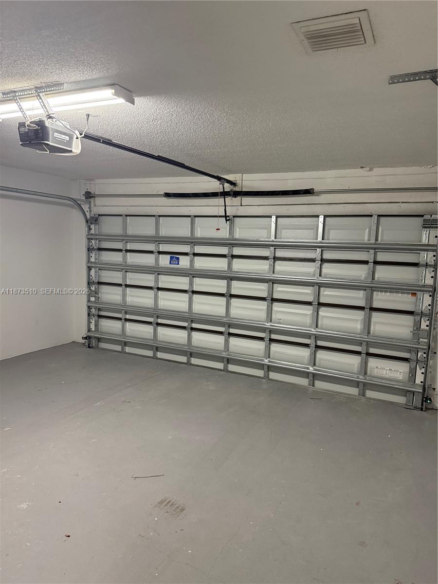 15921 Southwest 82nd Street Miami, FL 33193 - Photo 20 of 20 a view of a room with a white walls