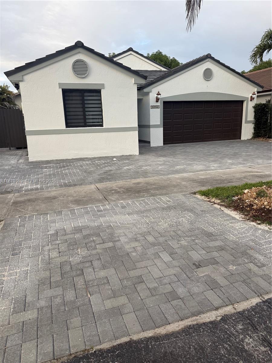 15921 Southwest 82nd Street Miami, FL 33193 - Photo 3 of 20 a view of garage