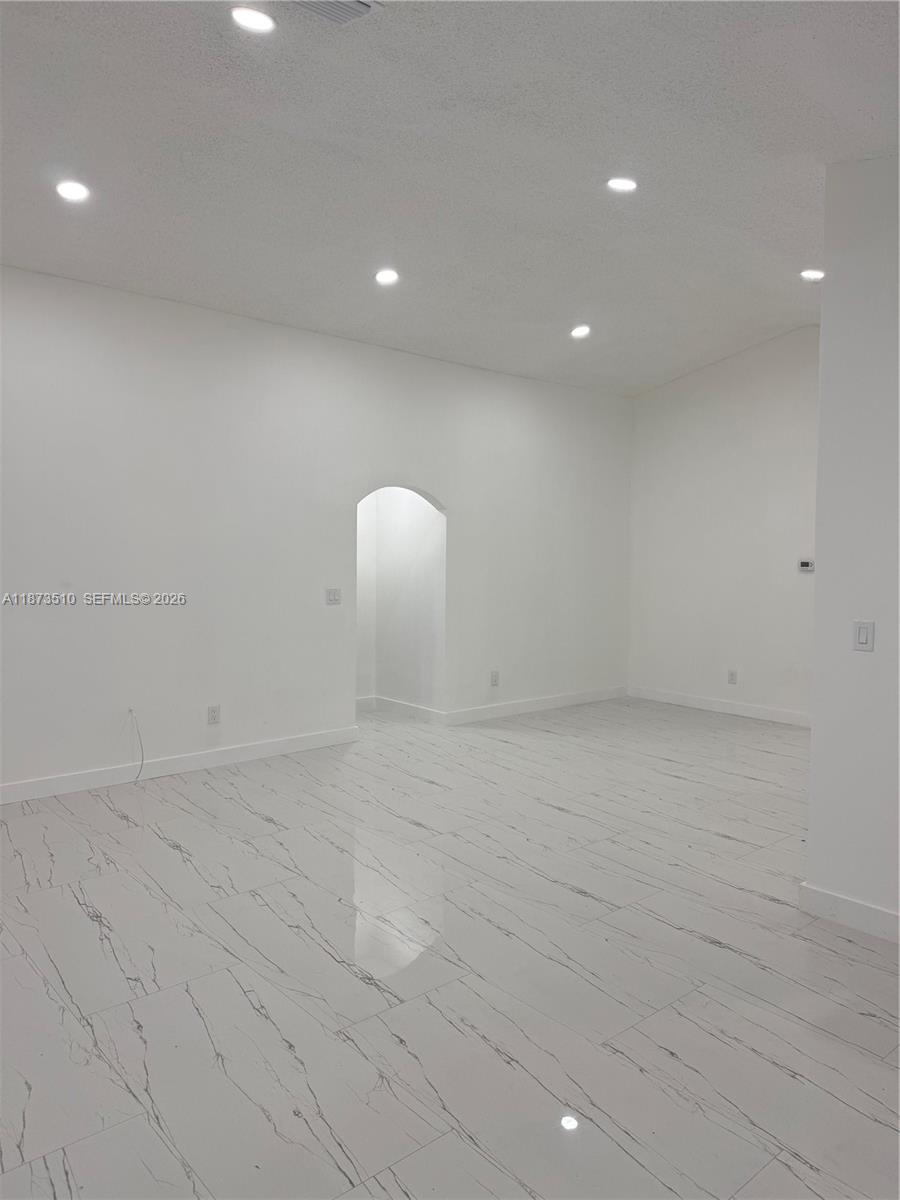 15921 Southwest 82nd Street Miami, FL 33193 - Photo 6 of 20 a view of empty room
