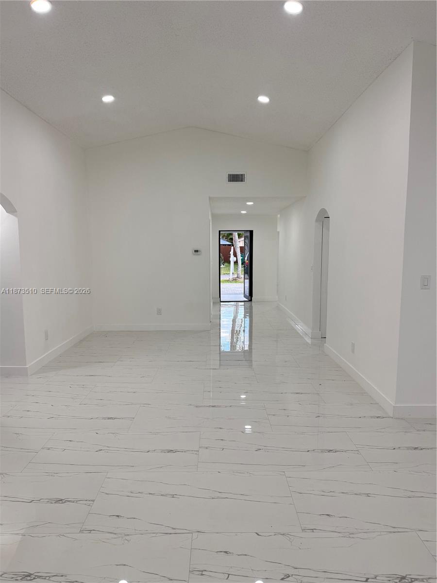 15921 Southwest 82nd Street Miami, FL 33193 - Photo 8 of 20 a view of an empty room
