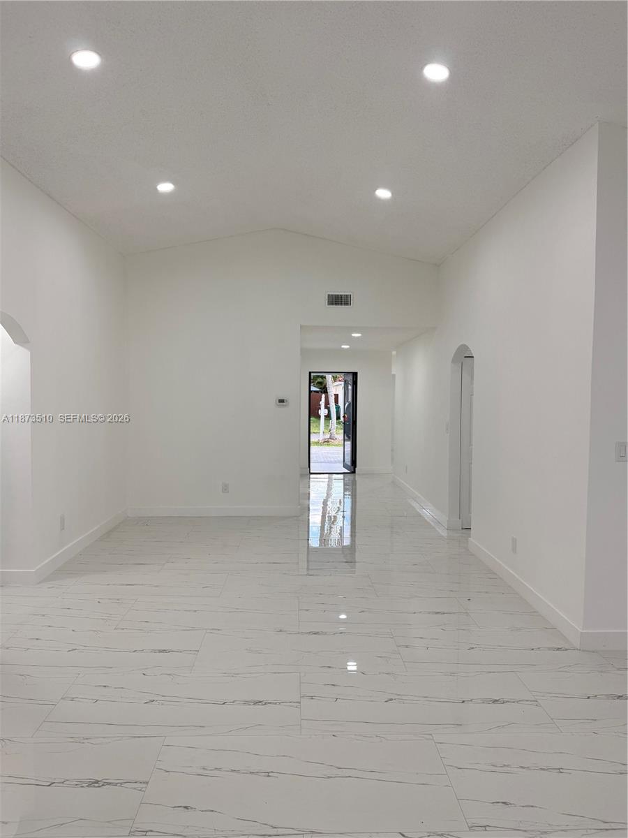 15921 Southwest 82nd Street Miami, FL 33193 - Photo 9 of 20 a view of empty room