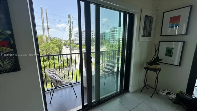 a view of a balcony with chairs