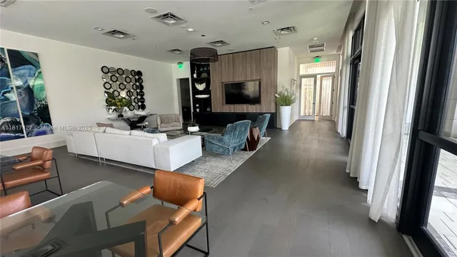 a view of a swimming pool with a deck