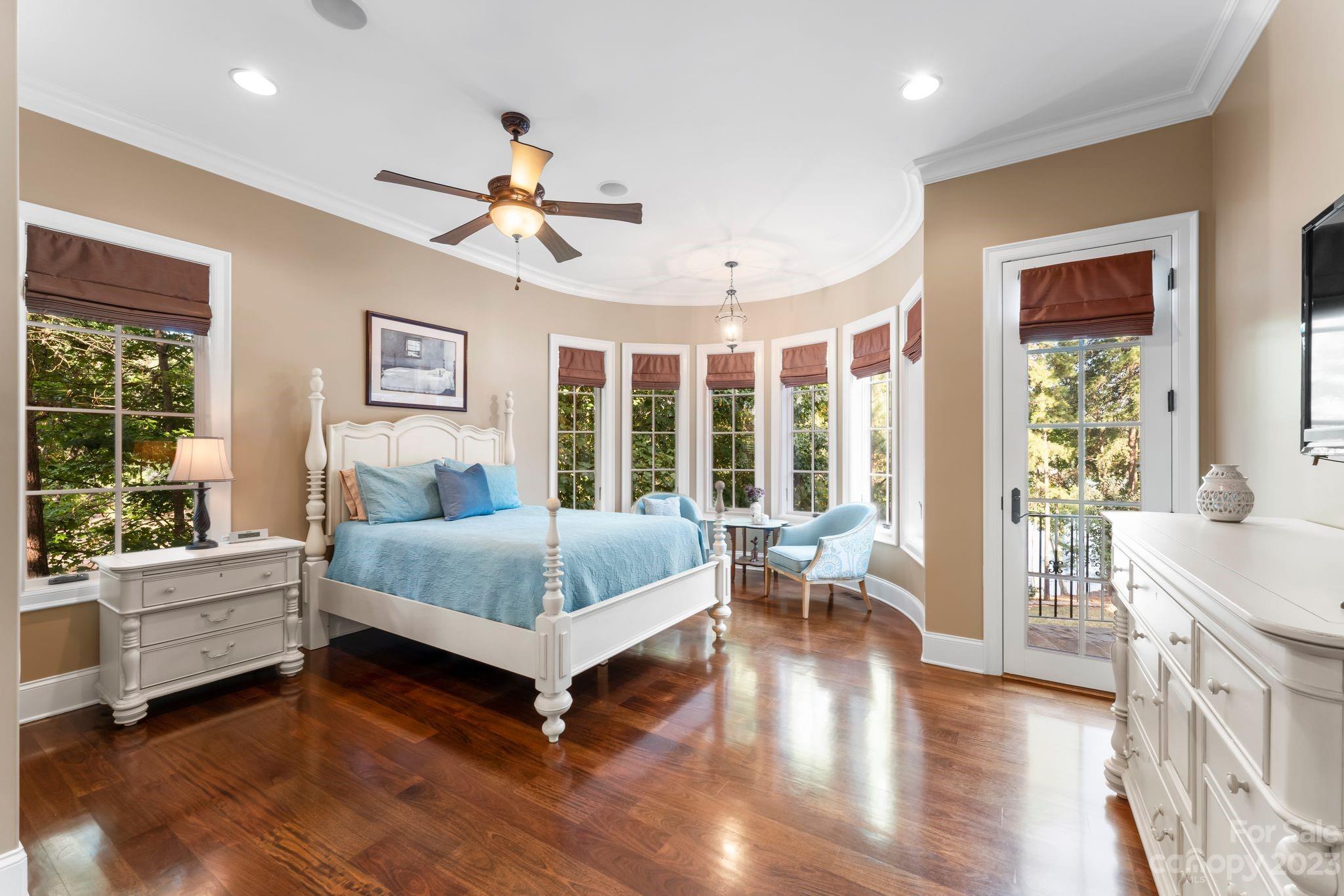 413 Bay Harbour Road Mooresville, NC 28117 - Photo 16 of 47 a bedroom with a bed and a large window