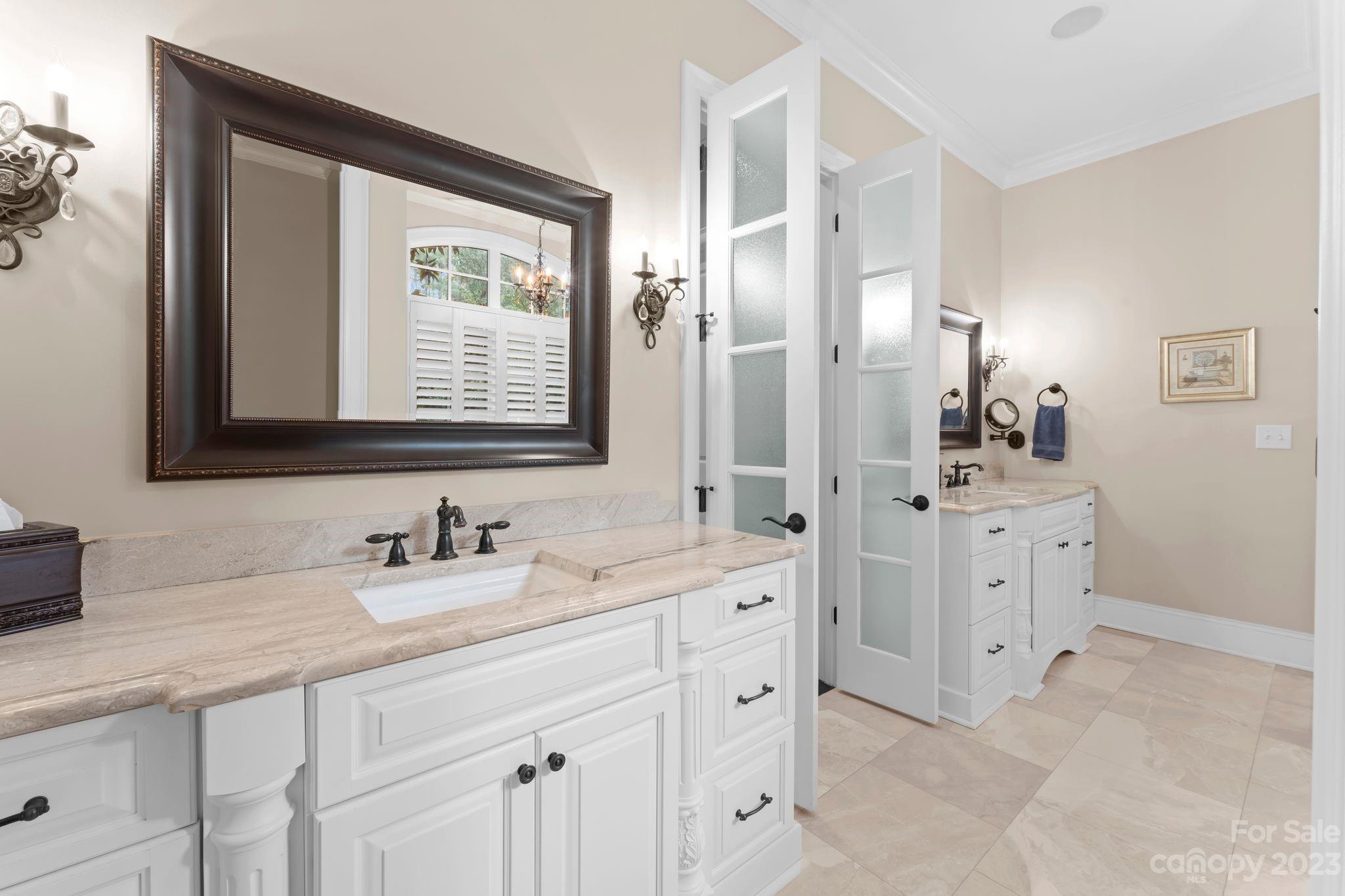 413 Bay Harbour Road Mooresville, NC 28117 - Photo 17 of 47 a bathroom with double sink and a mirror