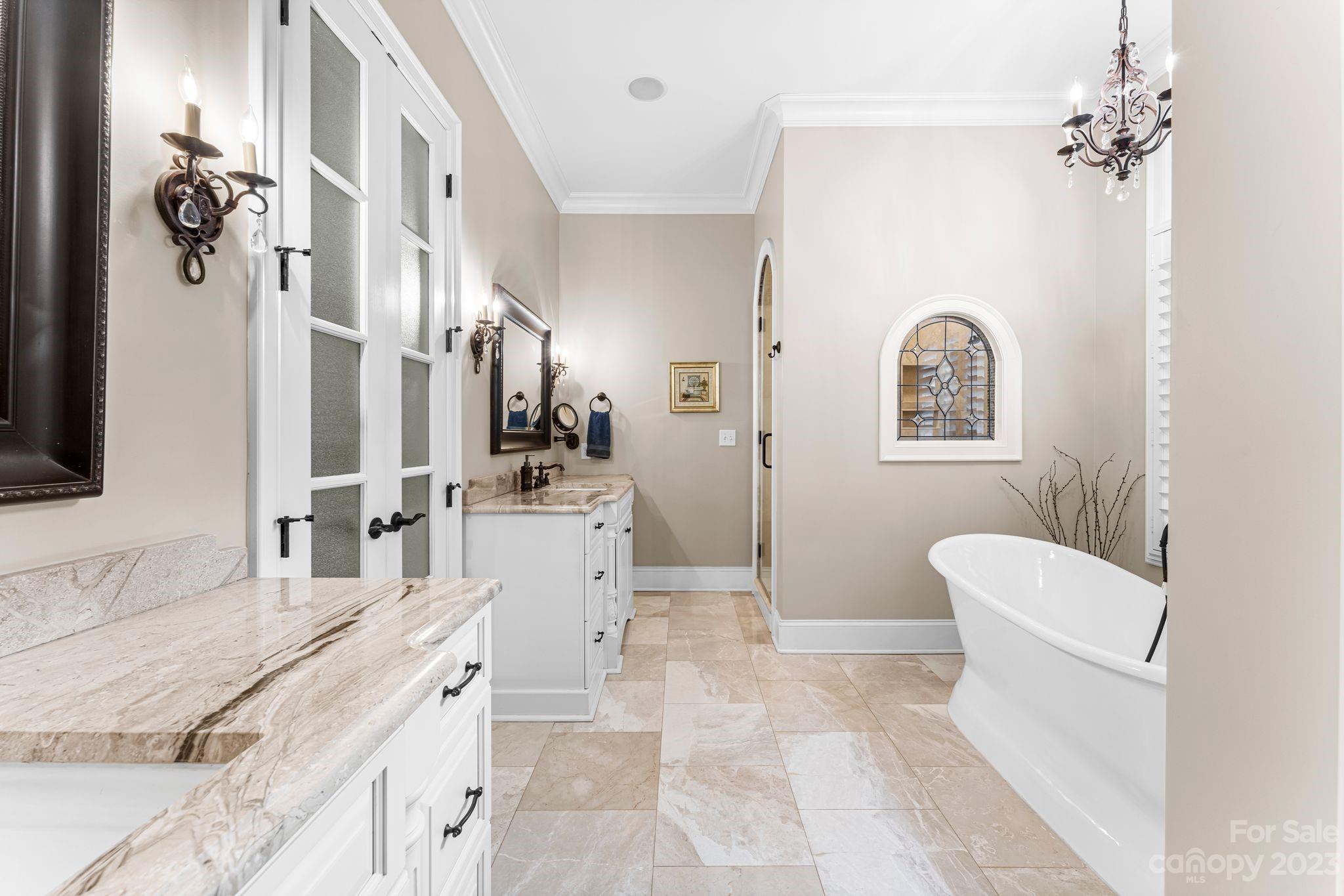 413 Bay Harbour Road Mooresville, NC 28117 - Photo 18 of 47 a spacious bathroom with a tub sink and mirror