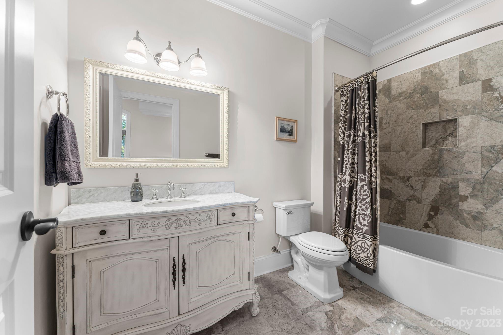 413 Bay Harbour Road Mooresville, NC 28117 - Photo 23 of 47 a bathroom with a toilet a sink a tub and mirror