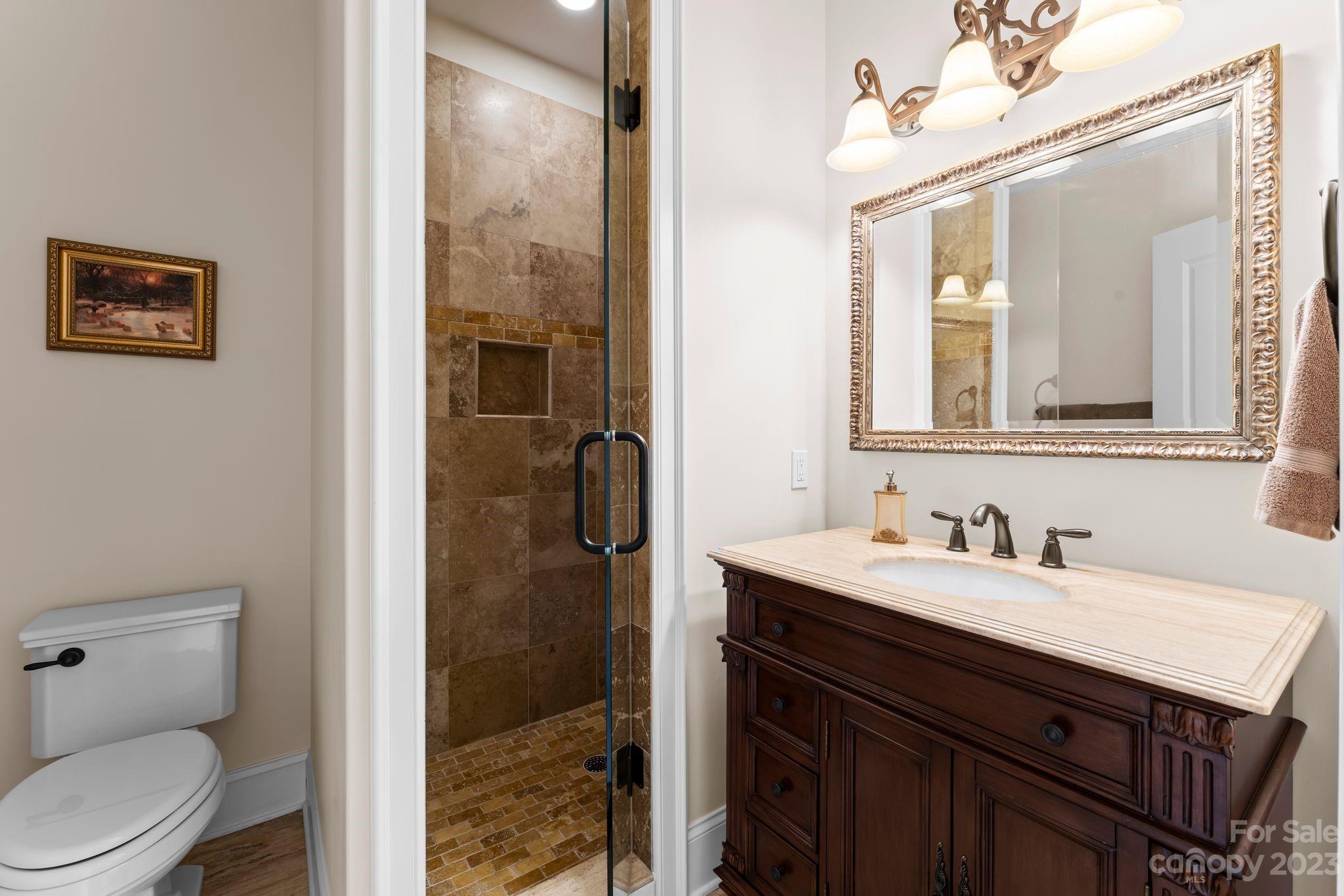 413 Bay Harbour Road Mooresville, NC 28117 - Photo 25 of 47 a bathroom with a sink a toilet and shower