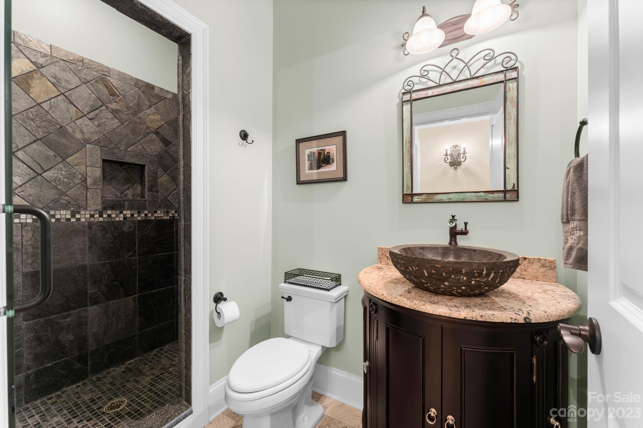 413 Bay Harbour Road Mooresville, NC 28117 - Photo 30 of 47 a bathroom with a toilet a sink and mirror