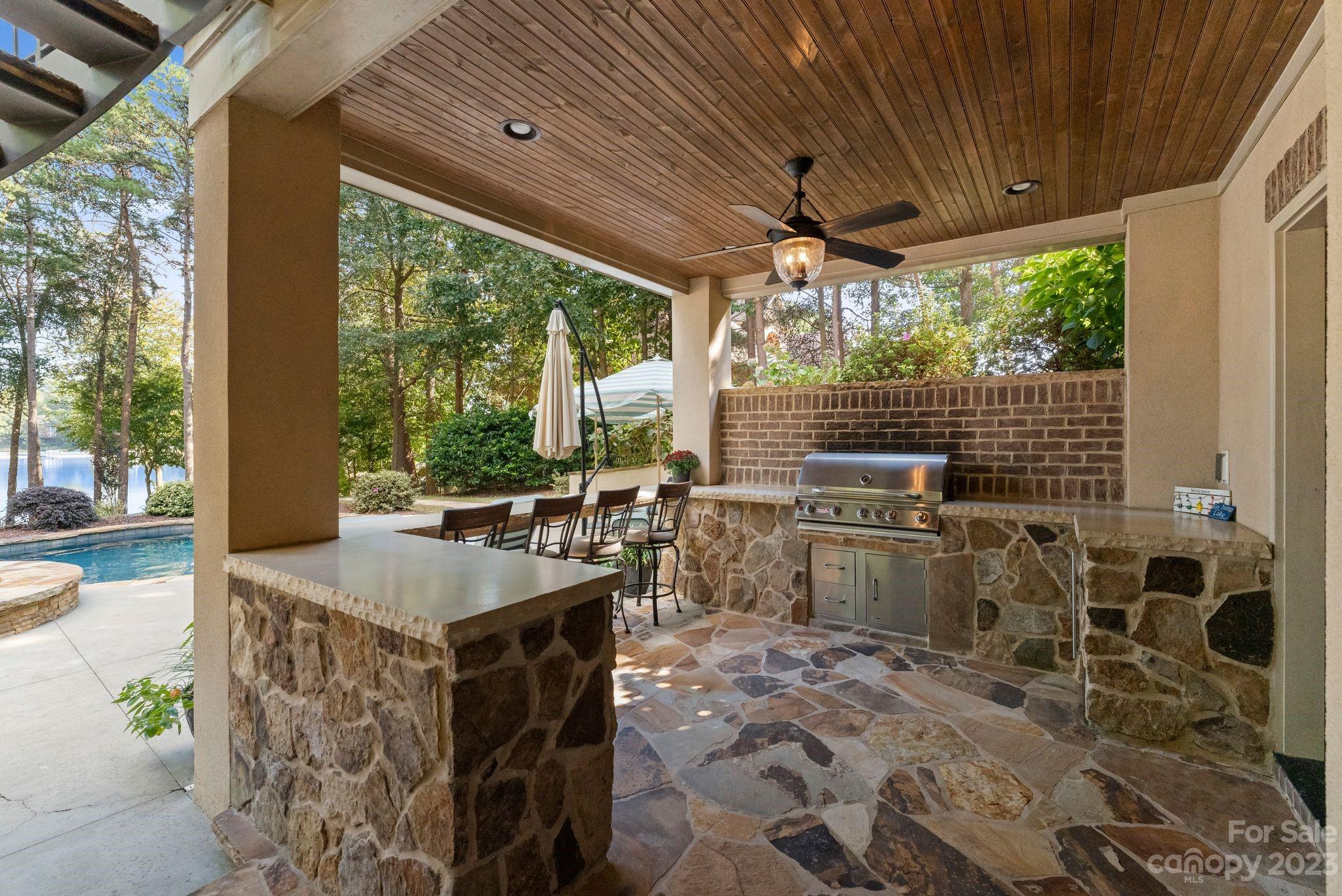 413 Bay Harbour Road Mooresville, NC 28117 - Photo 35 of 47 a table and chairs in the patio