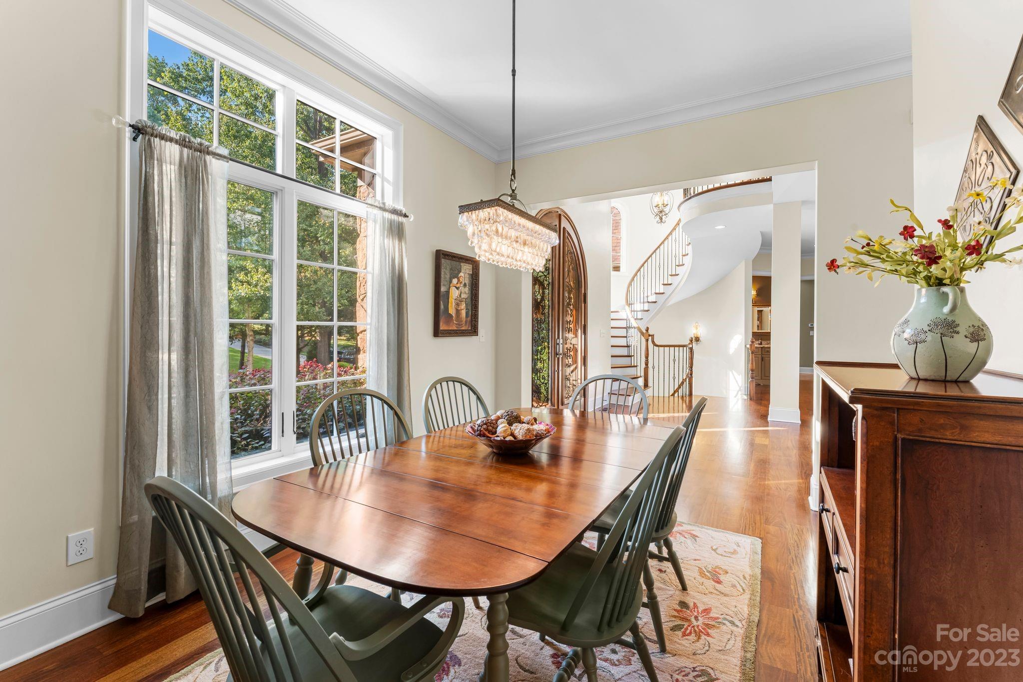 413 Bay Harbour Road Mooresville, NC 28117 - Photo 4 of 47 a dining room with furniture window and wooden floor