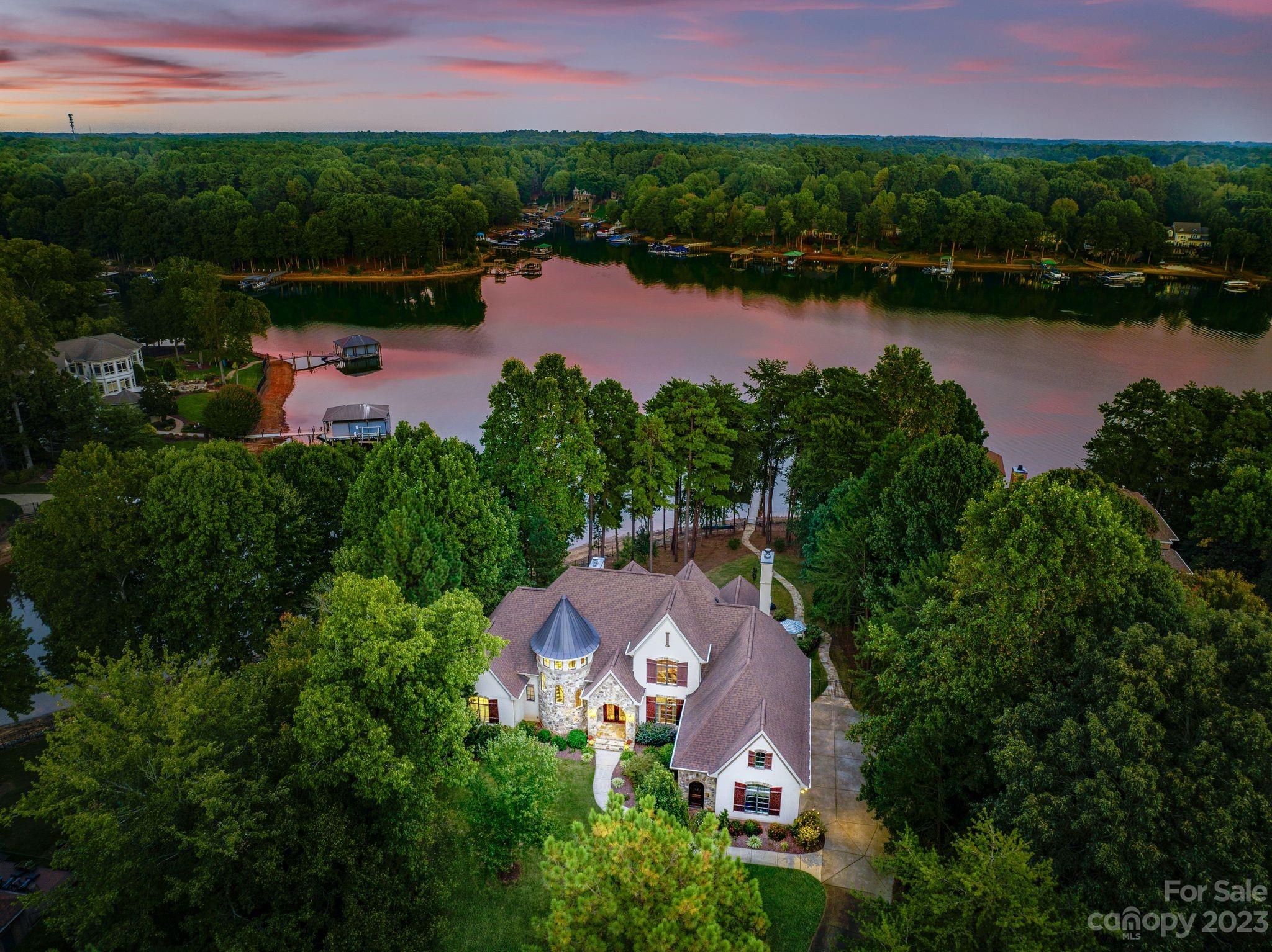 413 Bay Harbour Road Mooresville, NC 28117 - Photo 43 of 47 an aerial view of a house with a garden and lake view
