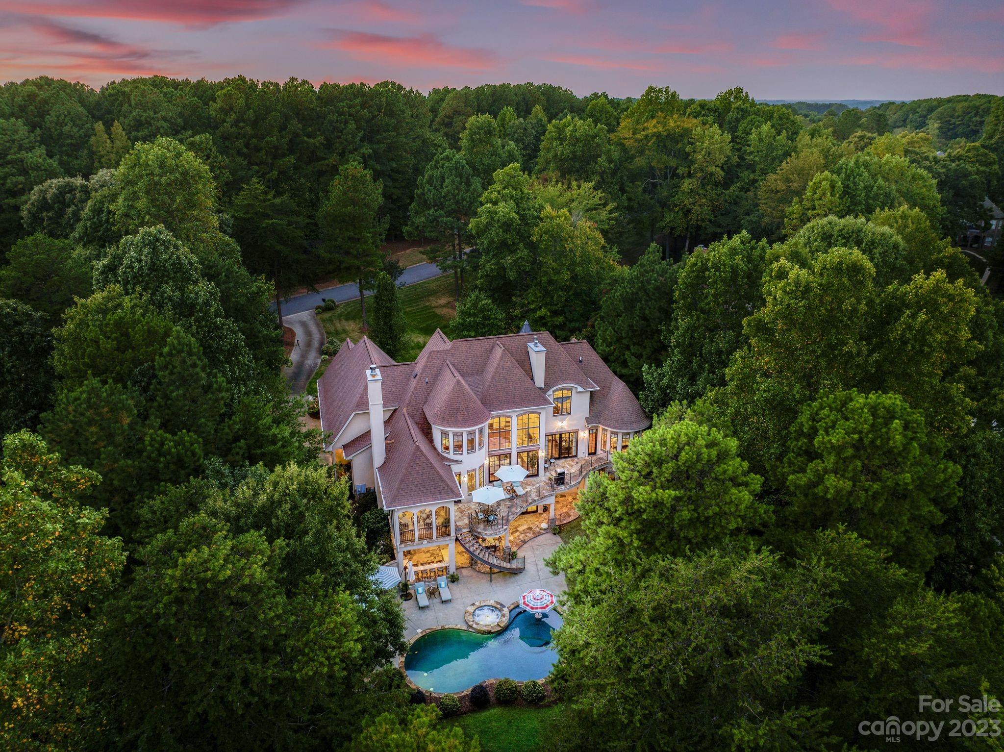 413 Bay Harbour Road Mooresville, NC 28117 - Photo 44 of 47 an aerial view of a house with yard and outdoor seating