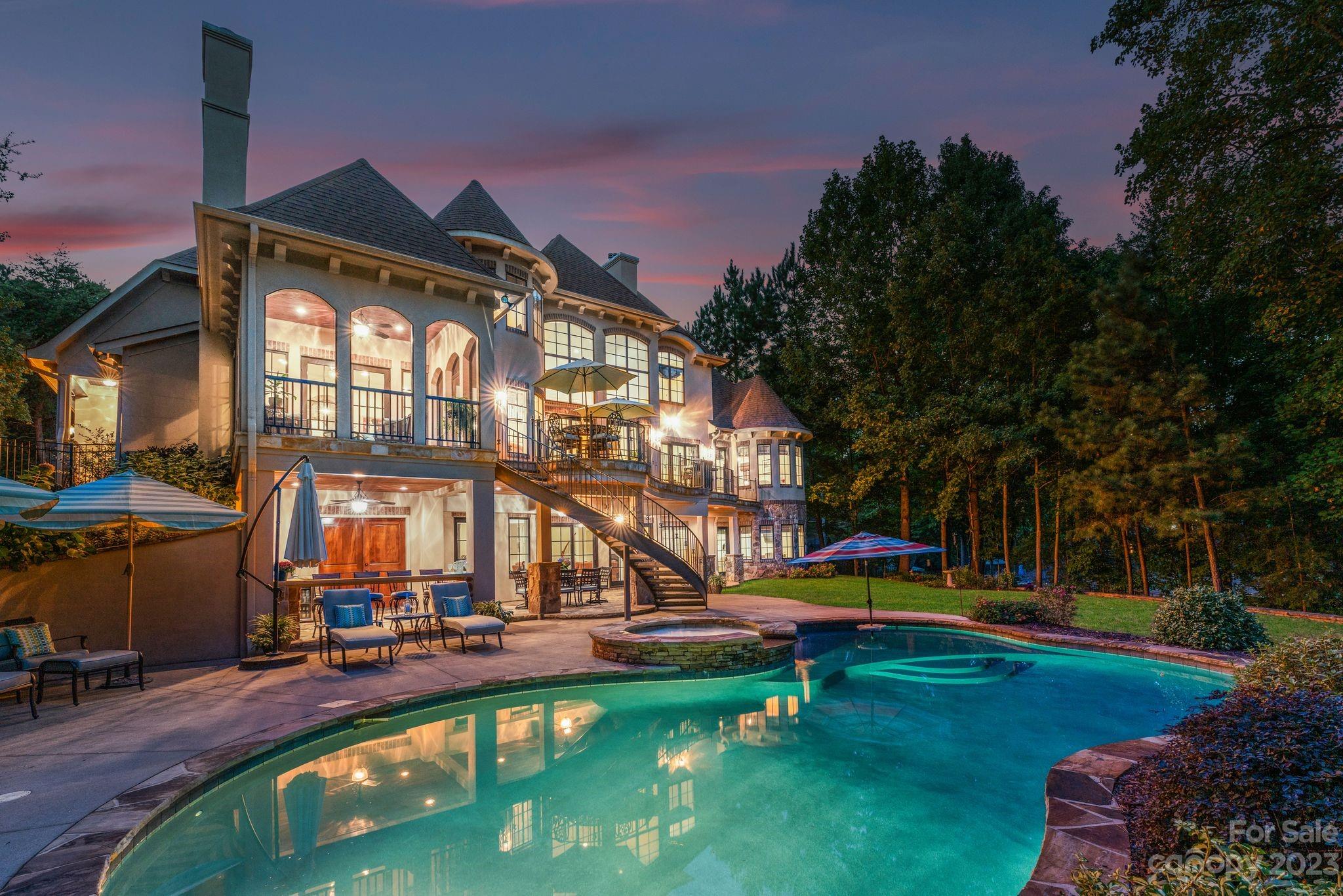 413 Bay Harbour Road Mooresville, NC 28117 - Photo 45 of 47 a view of pool with lawn chairs and large trees