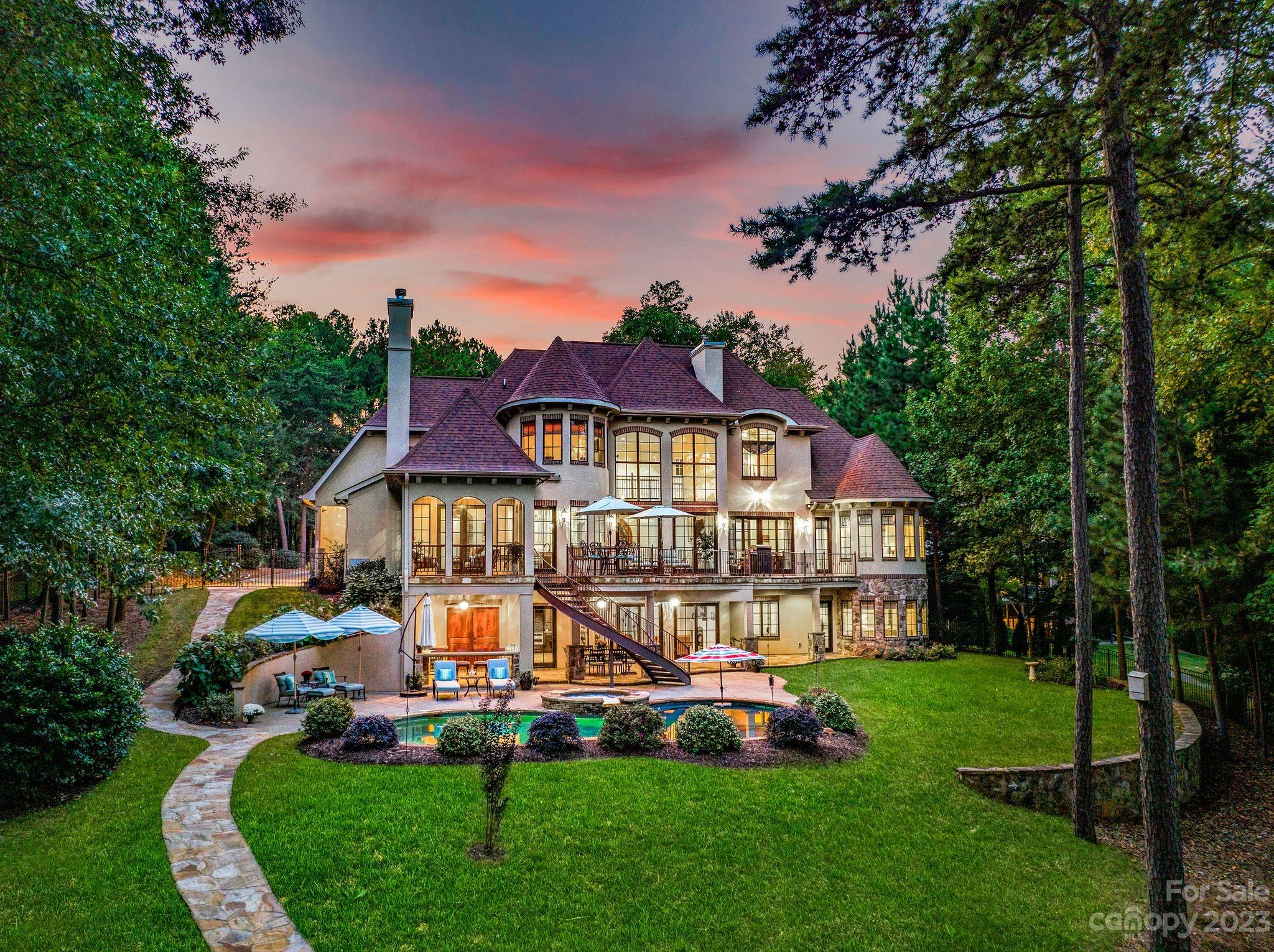413 Bay Harbour Road Mooresville, NC 28117 - Photo 46 of 47 a view of a big house with a big yard and large trees