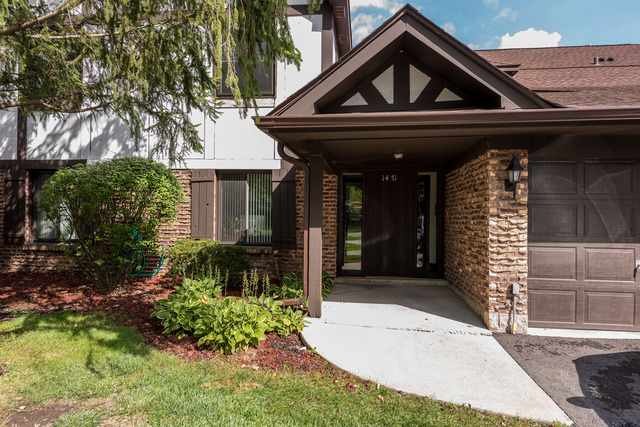 1471 Haverhill Drive, Unit B Wheaton, IL 60189 - Photo 1 of 25 a view of a entryway door of the house