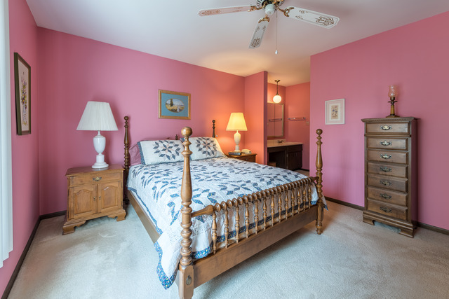 1471 Haverhill Drive, Unit B Wheaton, IL 60189 - Photo 16 of 25 a bedroom with a bed and a dresser