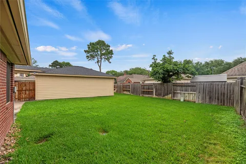 a view of a backyard with a garden