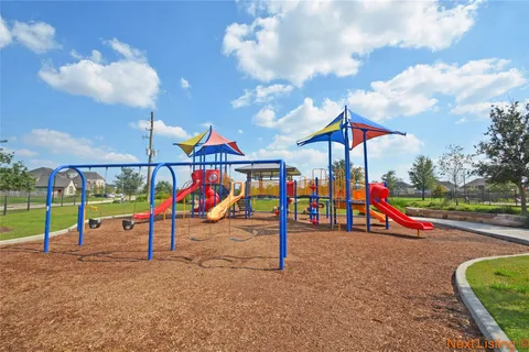 a view of park with swings