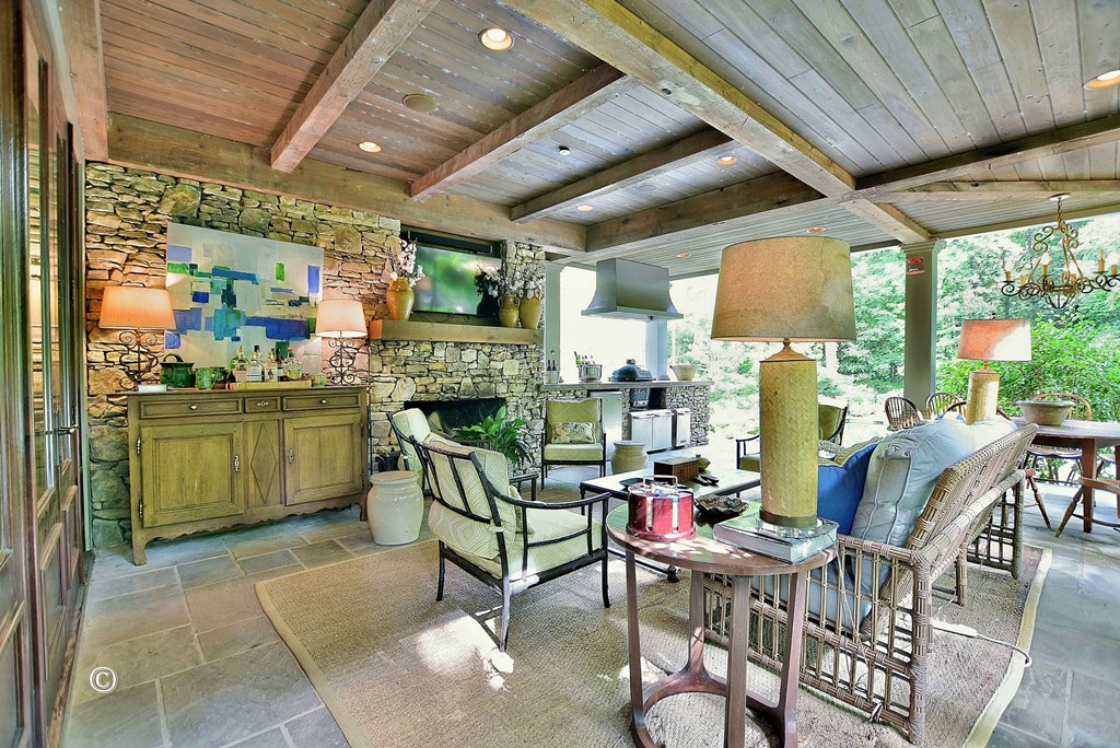 6528 Standing Boy Road Columbus, GA 31904 - Photo 16 of 44 a room with furniture a fireplace and a table