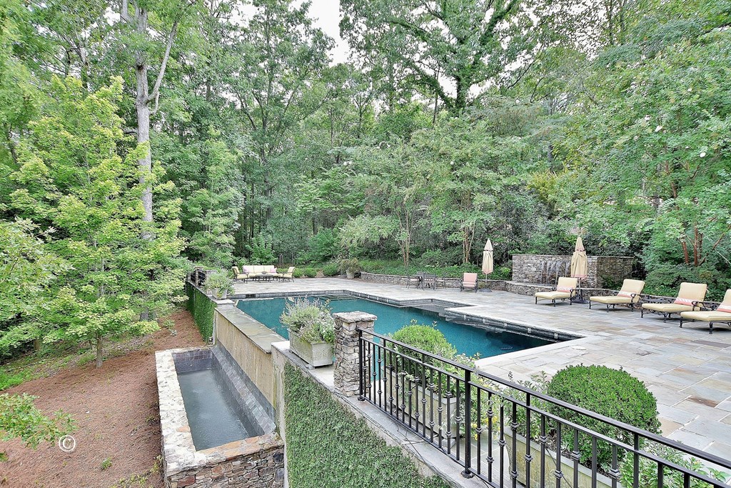 6528 Standing Boy Road Columbus, GA 31904 - Photo 24 of 44 a view of a balcony with wooden floor and fence