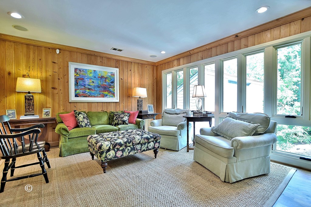 6528 Standing Boy Road Columbus, GA 31904 - Photo 25 of 44 a living room with furniture and a large window
