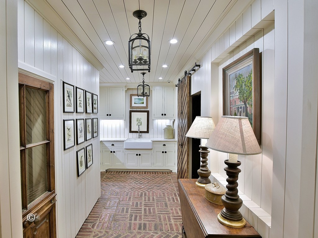 6528 Standing Boy Road Columbus, GA 31904 - Photo 33 of 44 a kitchen with a refrigerator and a sink