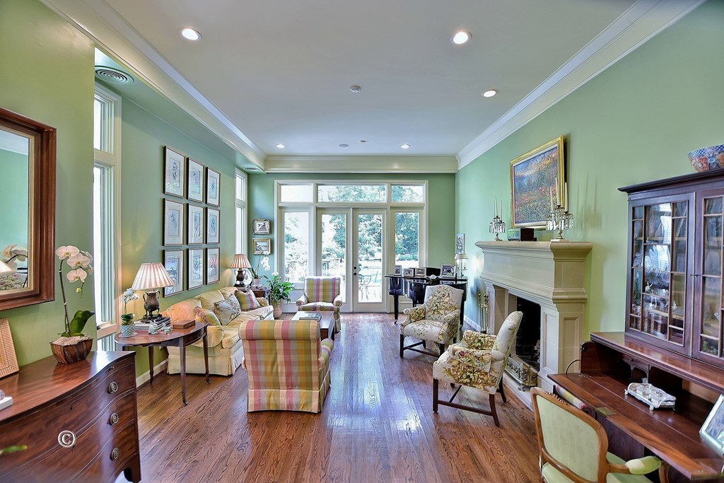 6528 Standing Boy Road Columbus, GA 31904 - Photo 4 of 44 a living room with fireplace furniture and a wooden floor