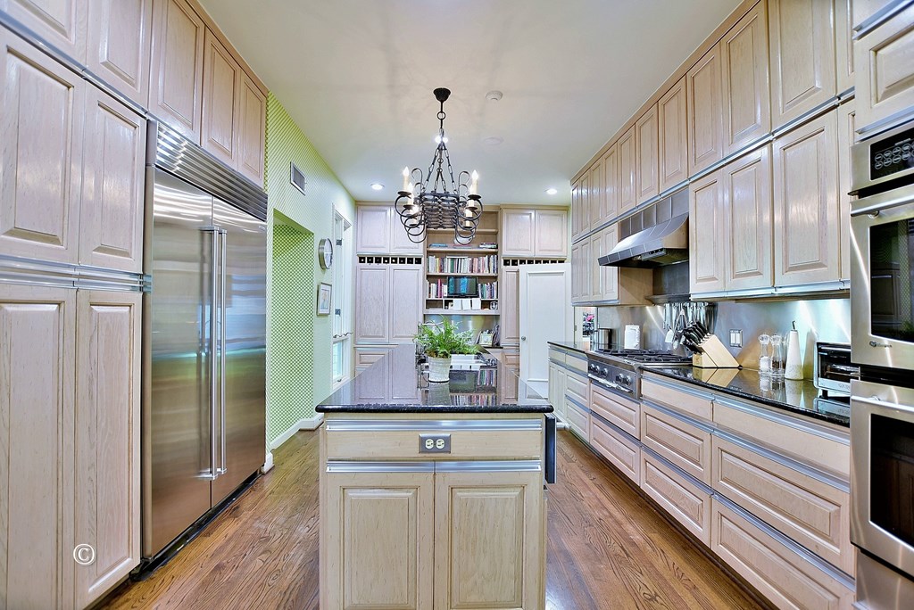 6528 Standing Boy Road Columbus, GA 31904 - Photo 10 of 44 a kitchen with stainless steel appliances granite countertop a refrigerator and a stove top oven