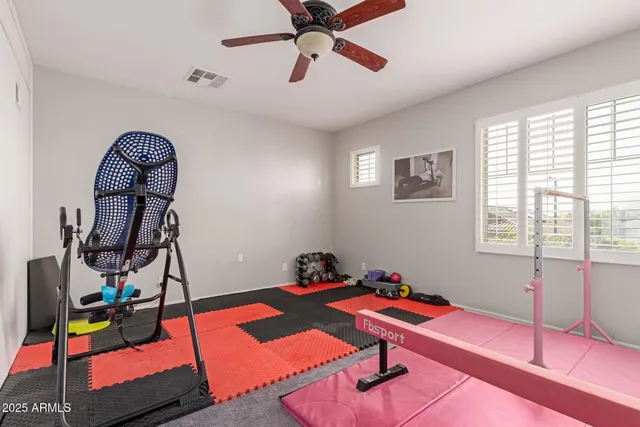 a room with furniture and air hockey table
